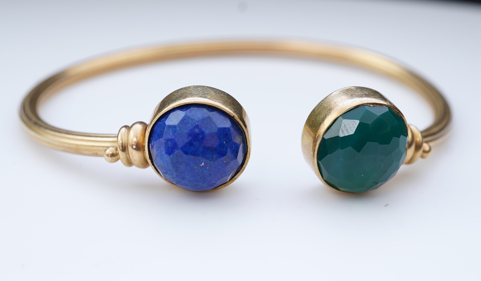 A gold, lapis lazuli and green chalcedony bangle